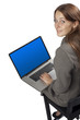 Smiling happy woman sitting and using laptop - High angle view