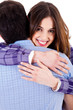 closeup of lady hugging man