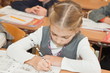 Schoolgirl wrote in a notebook
