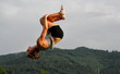 gymnast doing somersault gymnast doing somersault