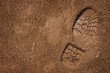 Footprint on mud with copy space