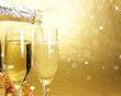 Champagne glasses on golden background Champagne glasses on golden background