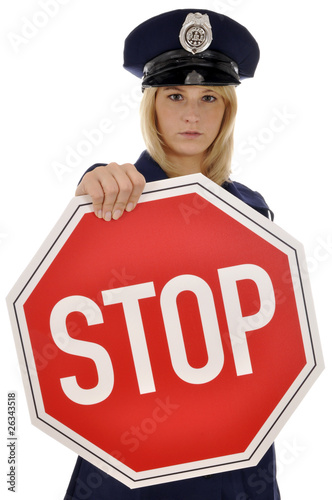 Photo: Polizistin mit Stop-Schild Polizistin mit Stop-Schild