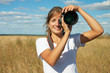 Young woman taking picture Young woman taking picture