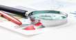 magnifying glass and the working paper