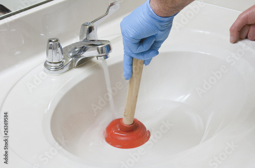 Photo: unplugging the sink unplugging the sink
