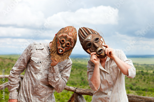 Photo: Couple in African masks Couple in African masks