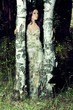 Foto: beautiful girl beetwen two trees beautiful girl beetwen two trees