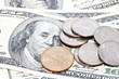 coins on dollars background