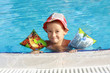 Photo: The boy of 3 years bathes in pool The boy of 3 years bathes in pool