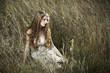 Beautiful woman at the field