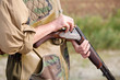 Hunter reloading its gun during teh hunting season