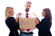 Businessman Hold Busy Sign with Two Businesswoman Flirting
