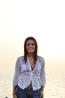 Young smiling  woman on the beach
