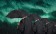 Businessmen in rain