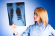Female doctor carefully x-ray of patient