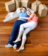 Couple lying on floor