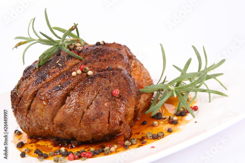 Photo: Roast pork with rosemary and some colorful peppercorns Roast pork with rosemary and some colorful peppercorns
