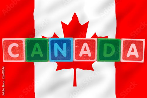 Photo: canada and flag in toy block letters canada and flag in toy block letters