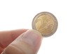 hand holding two euro