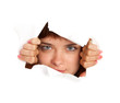 Girl is looking through a hole