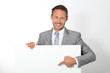 Businessman showing message board