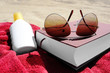 Foto: beach book sunglasses suncream towel 3 beach book sunglasses suncream towel 3