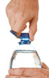 hand unscrew the cork on a bottle of water