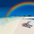 Rainbow over exotic holiday resort