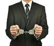 businessman handcuffed