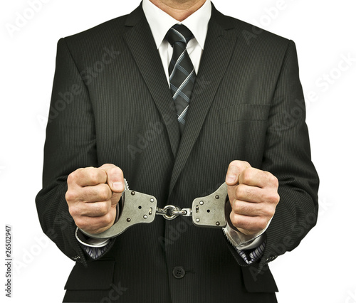 Photo: businessman handcuffed businessman handcuffed
