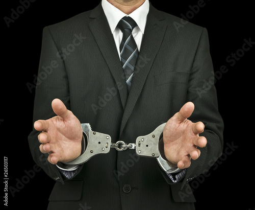 Photo: Businessman handcuffs Businessman handcuffs