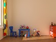 Child room with blue table.