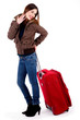 young lady posing with luggage
