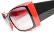 Red female sunglasses isolated on white