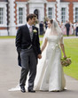 Bride and Groom outside stately home
