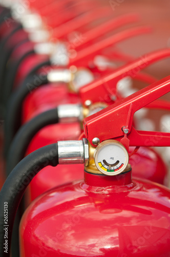 Photo: Group of ready fire extinguishers for use Group of ready fire extinguishers for use