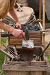 Foto: Ancient black smith craftsman working with steel Ancient black smith craftsman working with steel