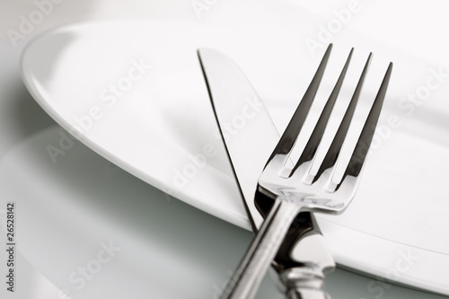Photo: Dinner plate, knife and fork silverware Dinner plate, knife and fork silverware