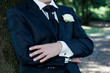 Groom with Tuxedo and Wedding Flower