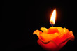 Burning candle in flower pattern