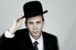 Businessman Holding a Bowler Hat