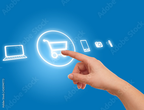 Photo: hand choosing shopping cart symbol hand choosing shopping cart symbol