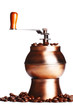 Photo: vintage coffee grinder standing on beans, white background vintage coffee grinder standing on beans, white background