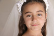 Photo: Close up of girl dressed for her first communion Close up of girl dressed for her first communion