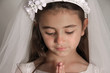 Photo: Girl in veil praying Girl in veil praying