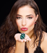 pretty young woman holding dices on black background pretty young woman holding dices on black background