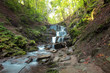 Autumn mountain waterfall. Beauty wild nature landscape