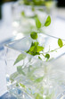 Elegant Table Decoration with Leaves in Glasses