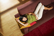 woman sleeping on sofa